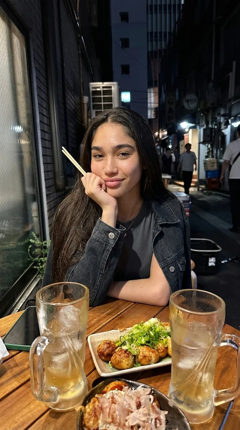 Kylie with a beer at an izakaya